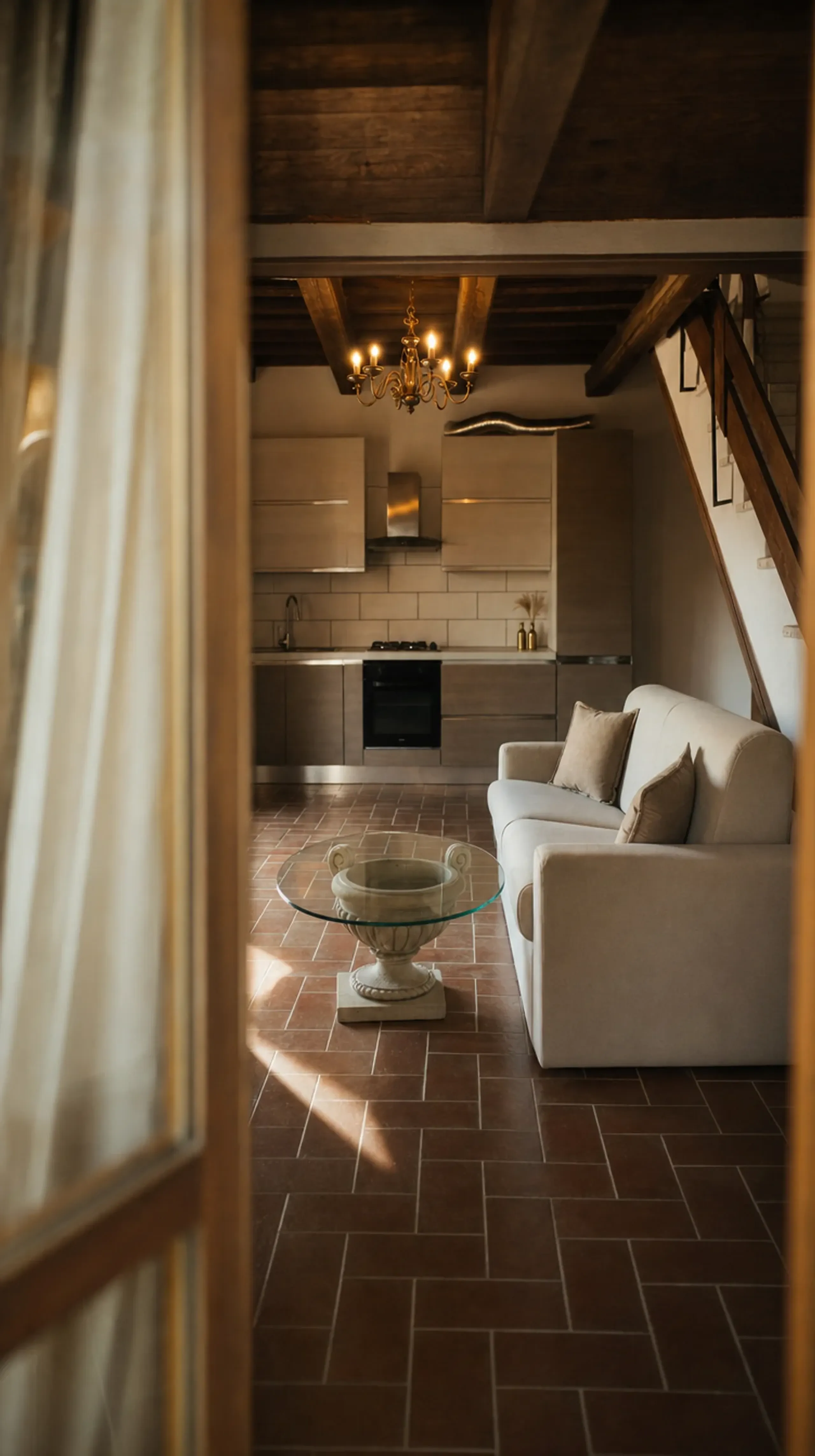 A sunlit sitting room with linen curtains and a soft sofa