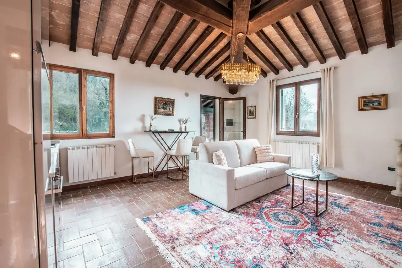 The Positano Suite — a cozy, intimate Tuscan hideaway with hillside views